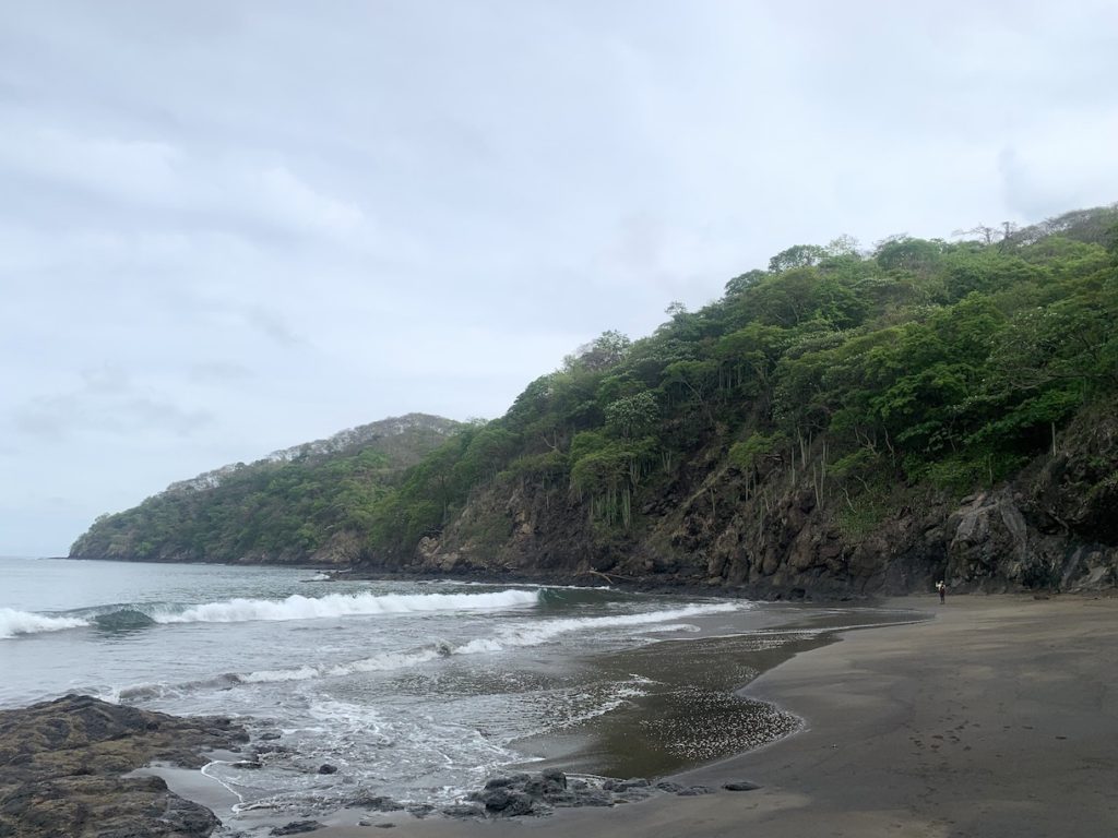 Playas del Coco beach with green hills 