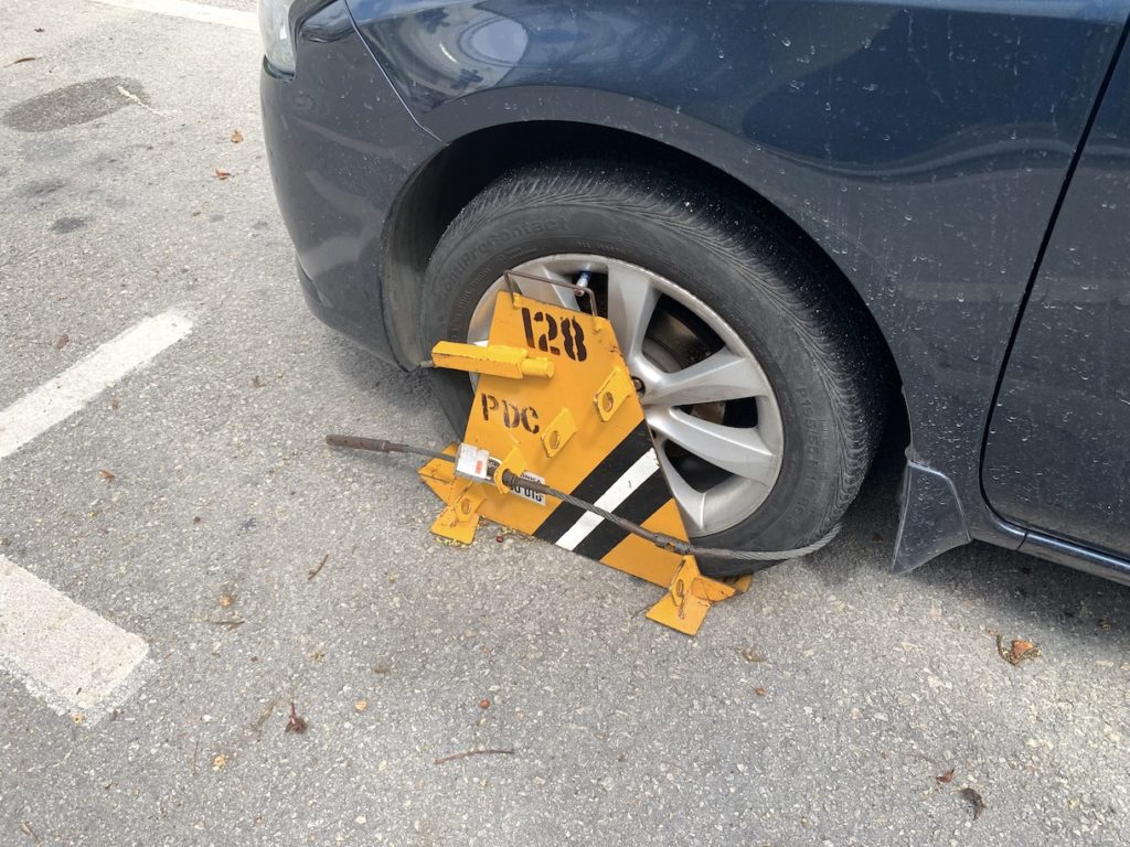Car with a parking boot