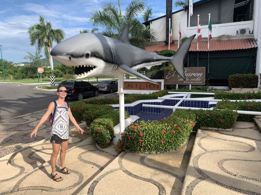 Mrs. ItchyFeet and shark statue