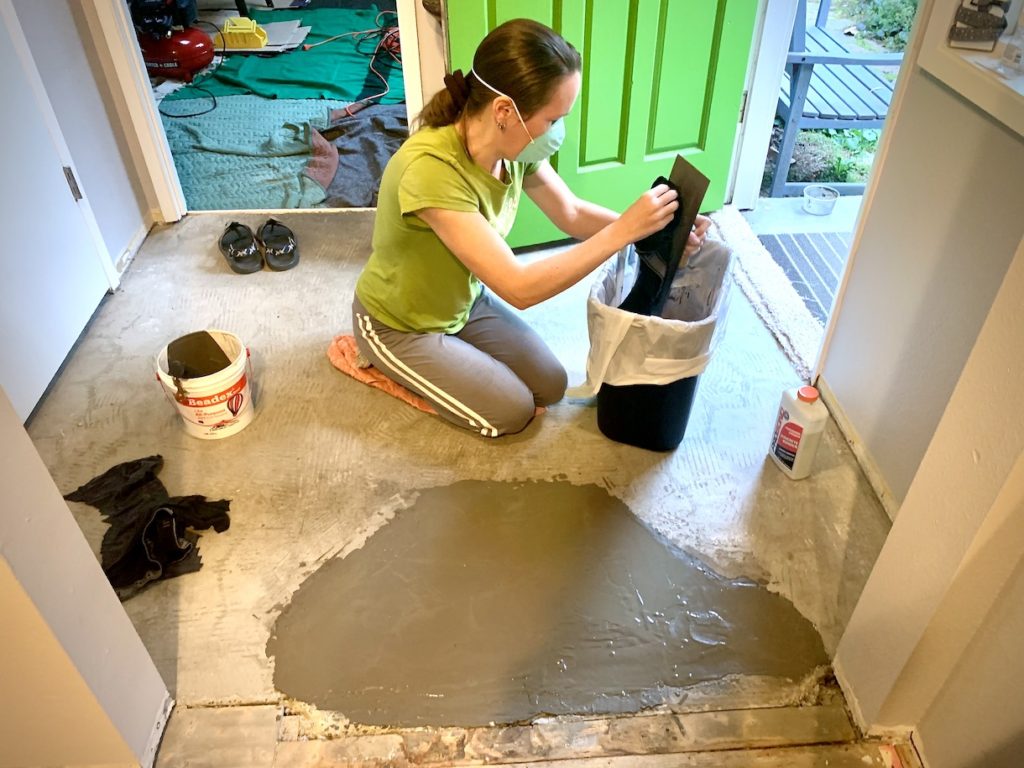 Mrs. ItchyFeet working on a concrete patch