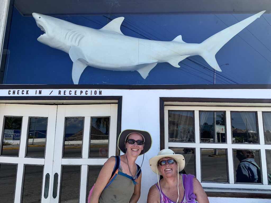 Mrs. ItchyFeet and Mum-in-Law under shark statue