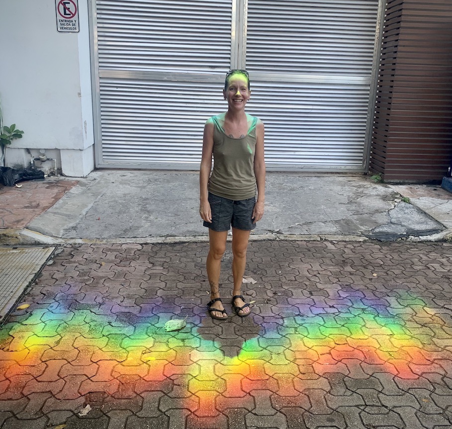 Mrs. ItchyFeet in a rainbow