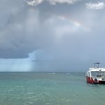 Rainbow over snorkel tour boat