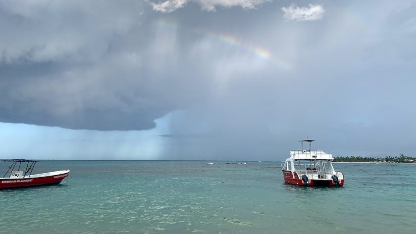 Rainbow over snorkel tour boat