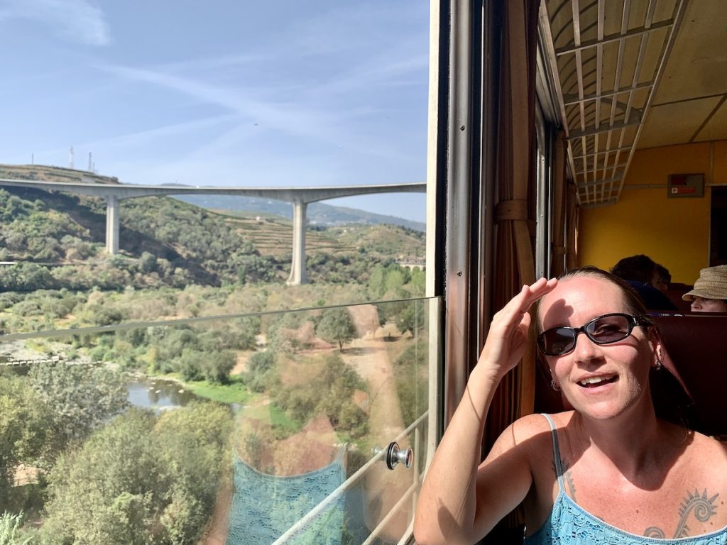 Mrs. ItchyFeet on the train along the Douro River