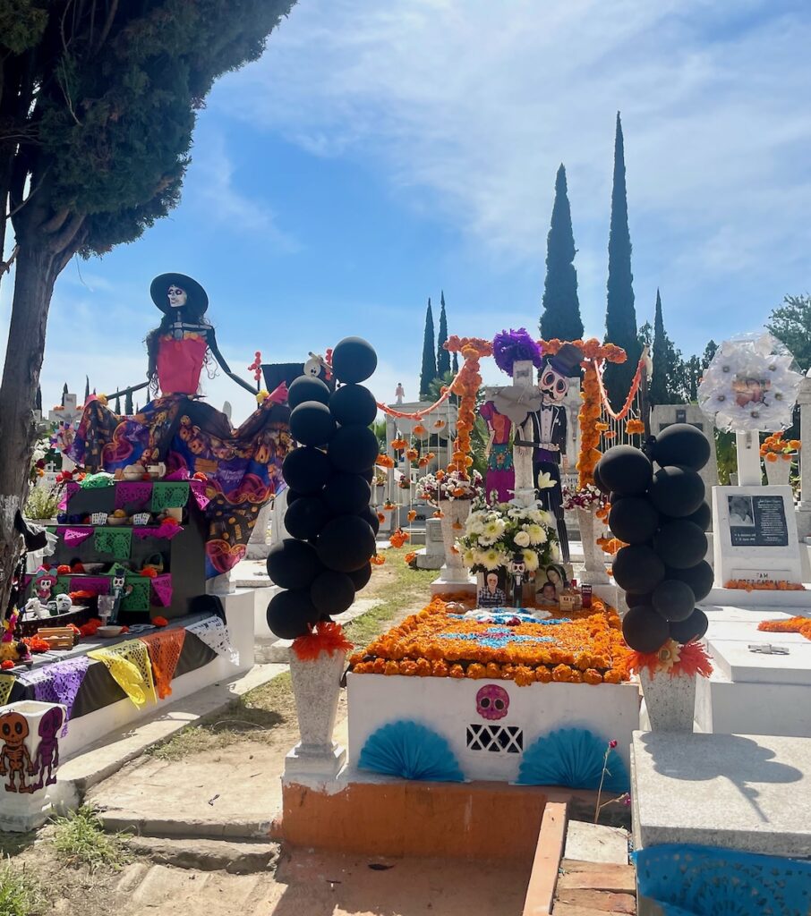 Decorated gravesites for Día de los Muertos