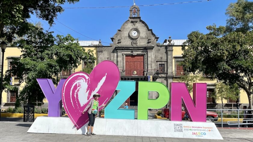 Mrs. ItchyFeet in front of Zapopan letters