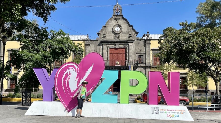 Mrs. ItchyFeet in front of Zapopan letters