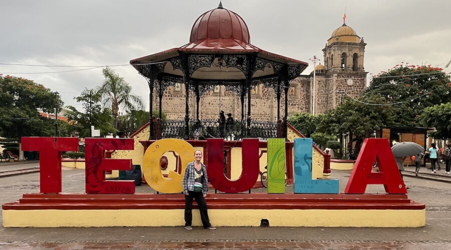 Mrs. ItchyFeet in front of Tequila town letters