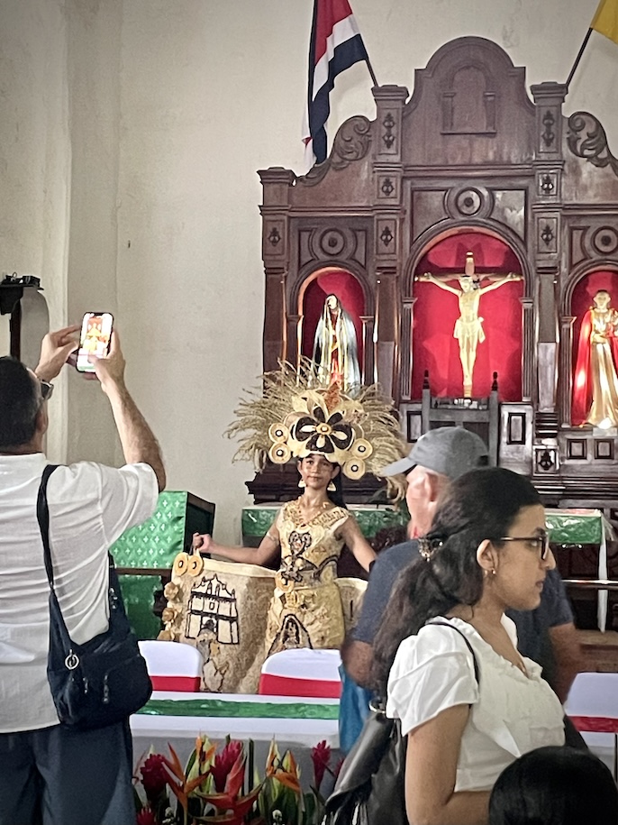 Child in costume inside the old church