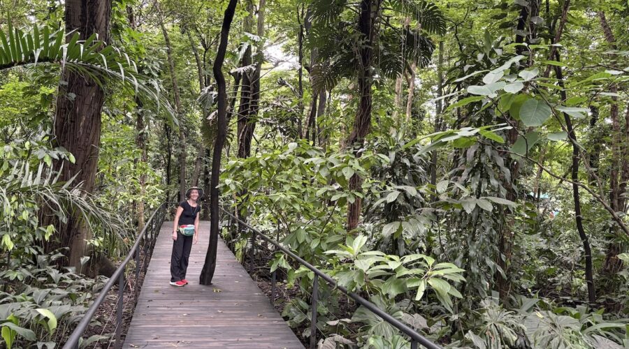 Mrs. ItchyFeet on botanical garden boardwalk