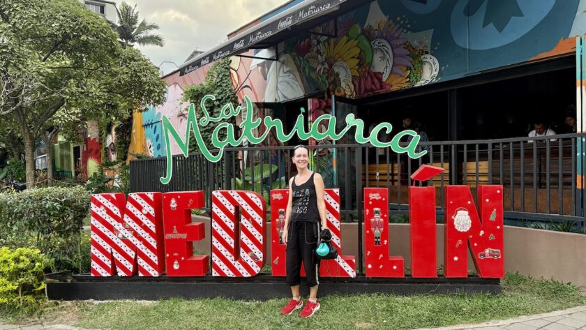 Mrs. ItchyFeet in front of Medellín letters