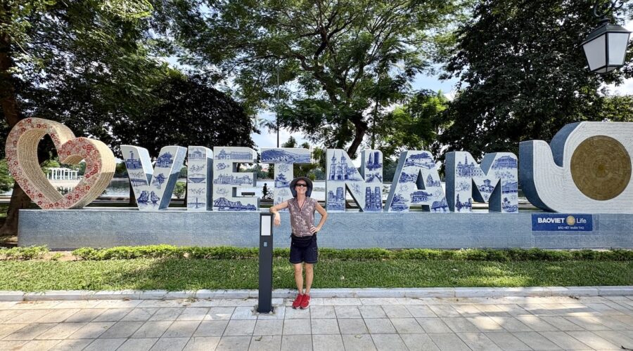 Mrs. ItchyFeet in front of Vietnam letters