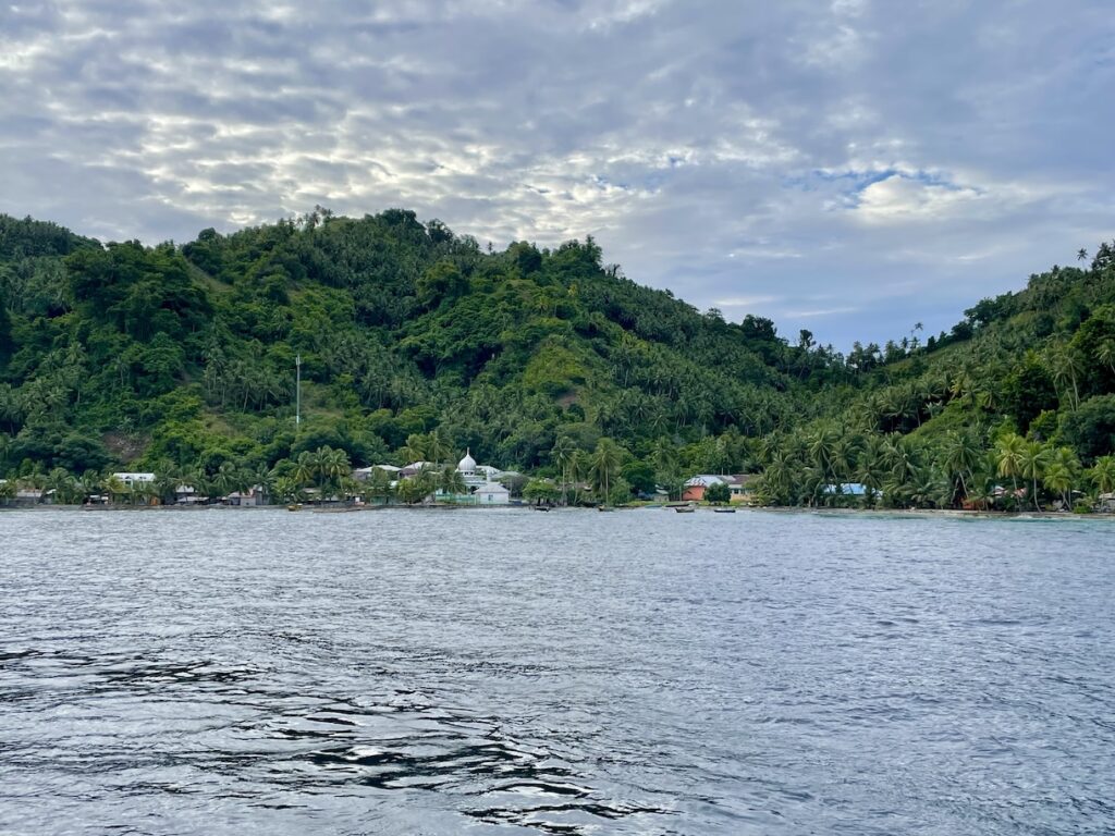 Tiny fishing village with mosque