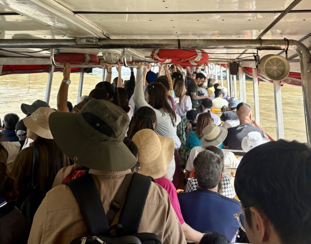 Packed ferry on Chao Phraya River