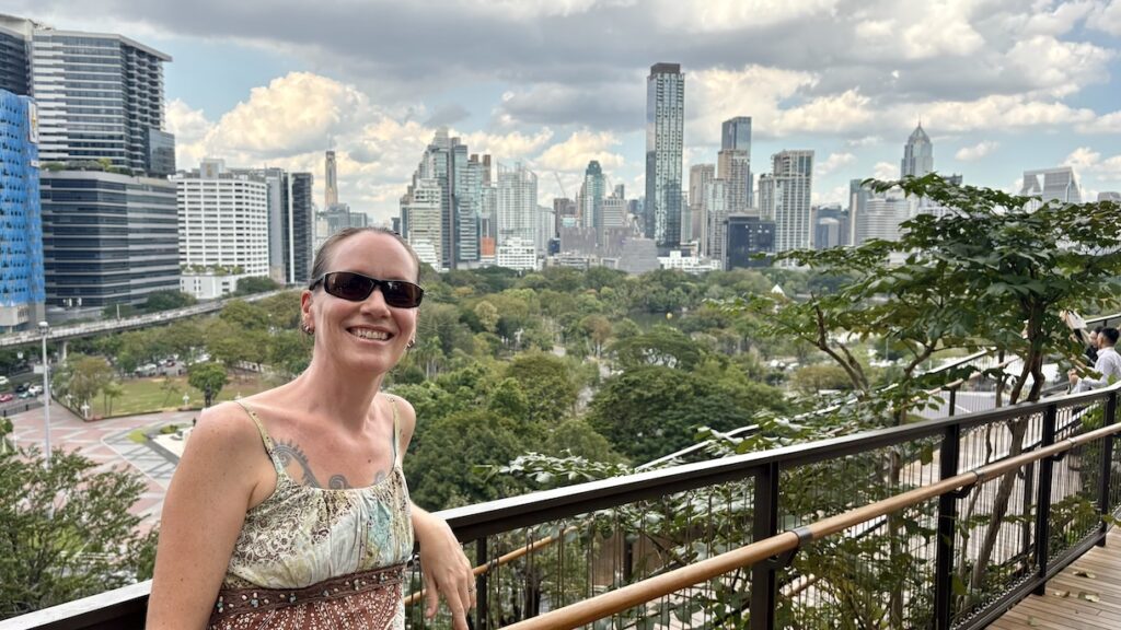 Mrs. ItchyFeet in Central Park Mall with view of Lumphini Park