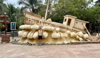 Mrs. ItchyFeet in front of Phu Quoc letters