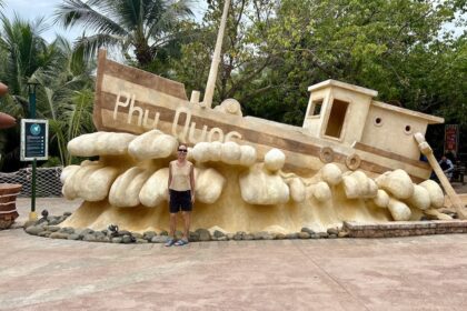 Mrs. ItchyFeet in front of Phu Quoc letters