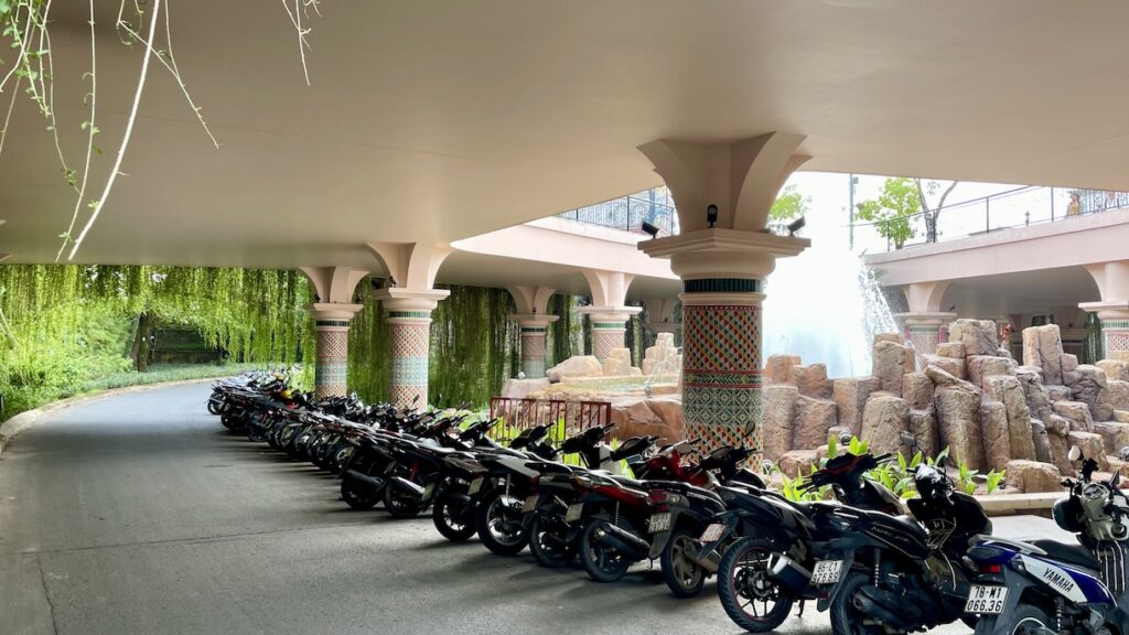 Motorcycles in front of fountain