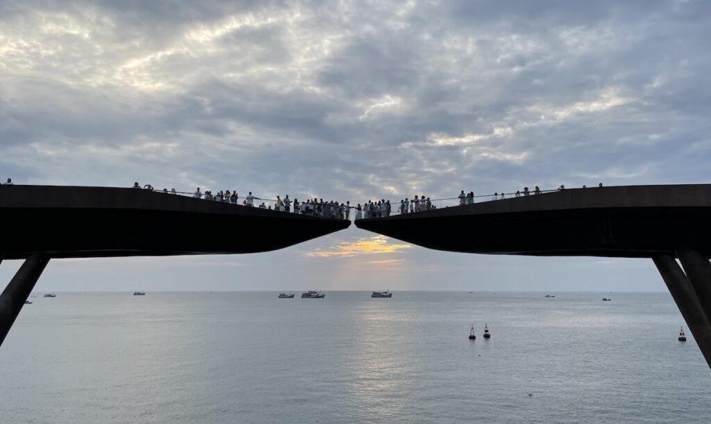 View of crowds on Kiss Bridge from second bridge