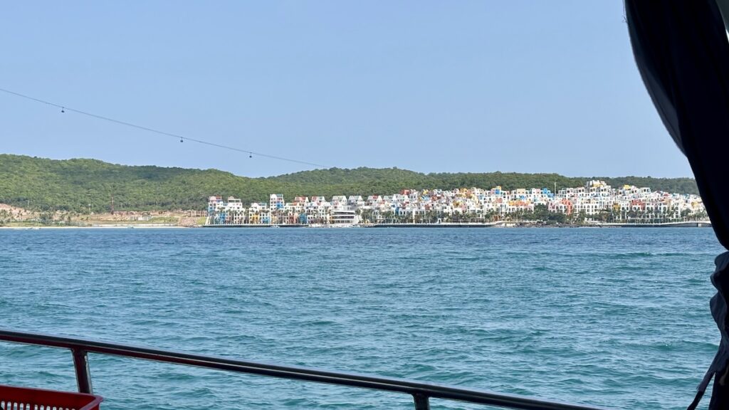 Sun World beach and aerial cable car from boat