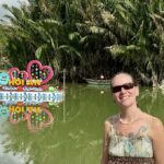 Mrs. ItchyFeet with Hội An letters in river