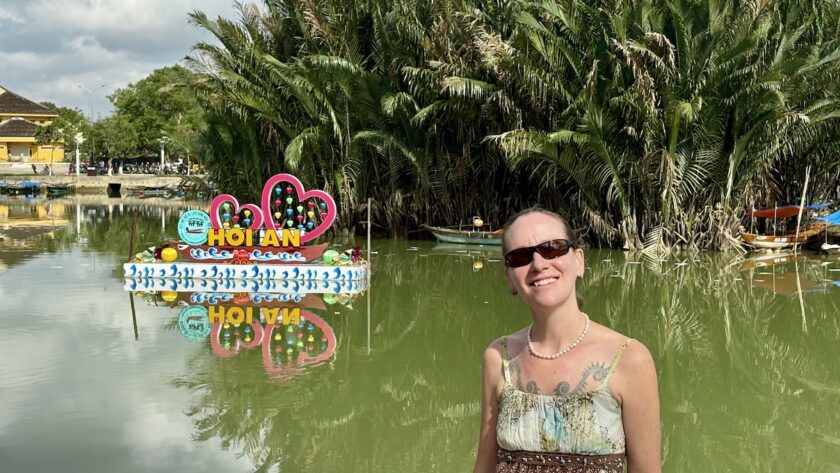 Mrs. ItchyFeet with Hội An letters in river
