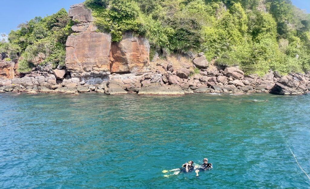 Scuba divers in water at snorkel spot number two