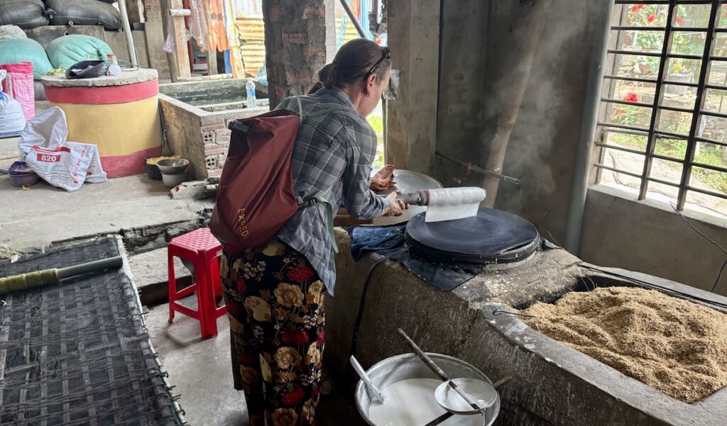 Mrs. ItchyFeet making rice paper