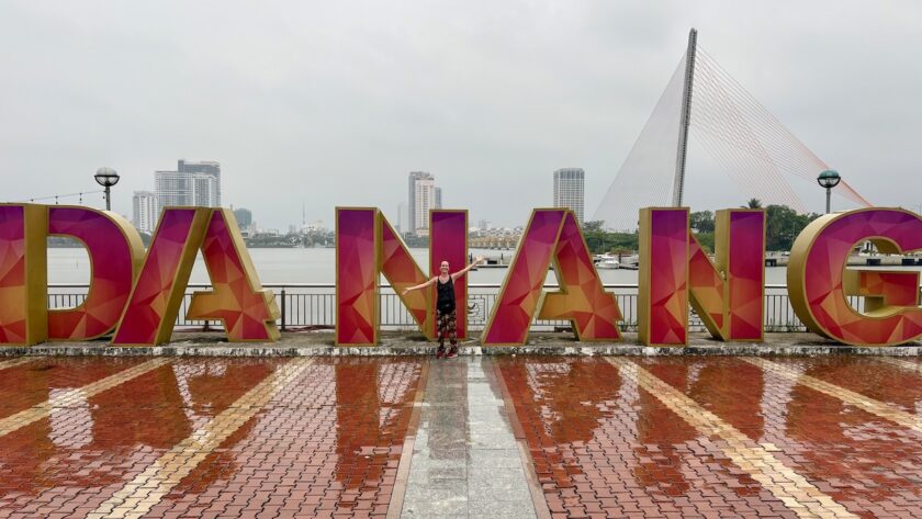 Mrs. ItchyFeet and Đà Nẵng letters in the rain