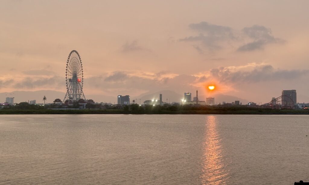 Sunset over Đà Nẵng with ferris wheel