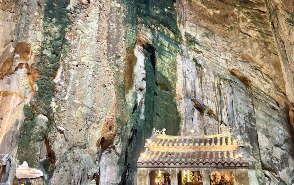 Dark and light faces inside cave