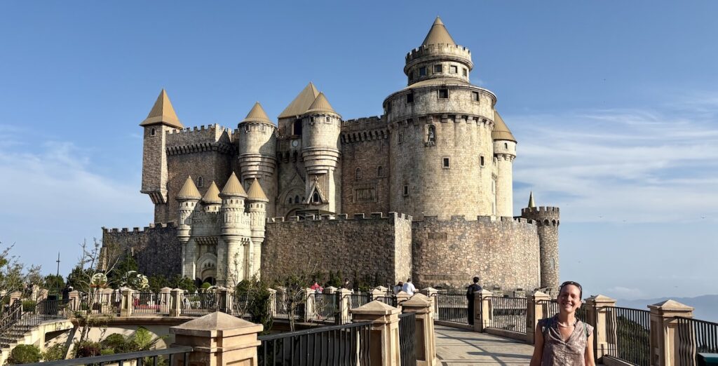 Mrs. ItchyFeet in front of castle