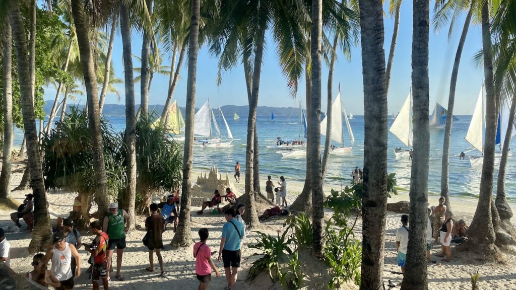 White Sand Beach with sail boats